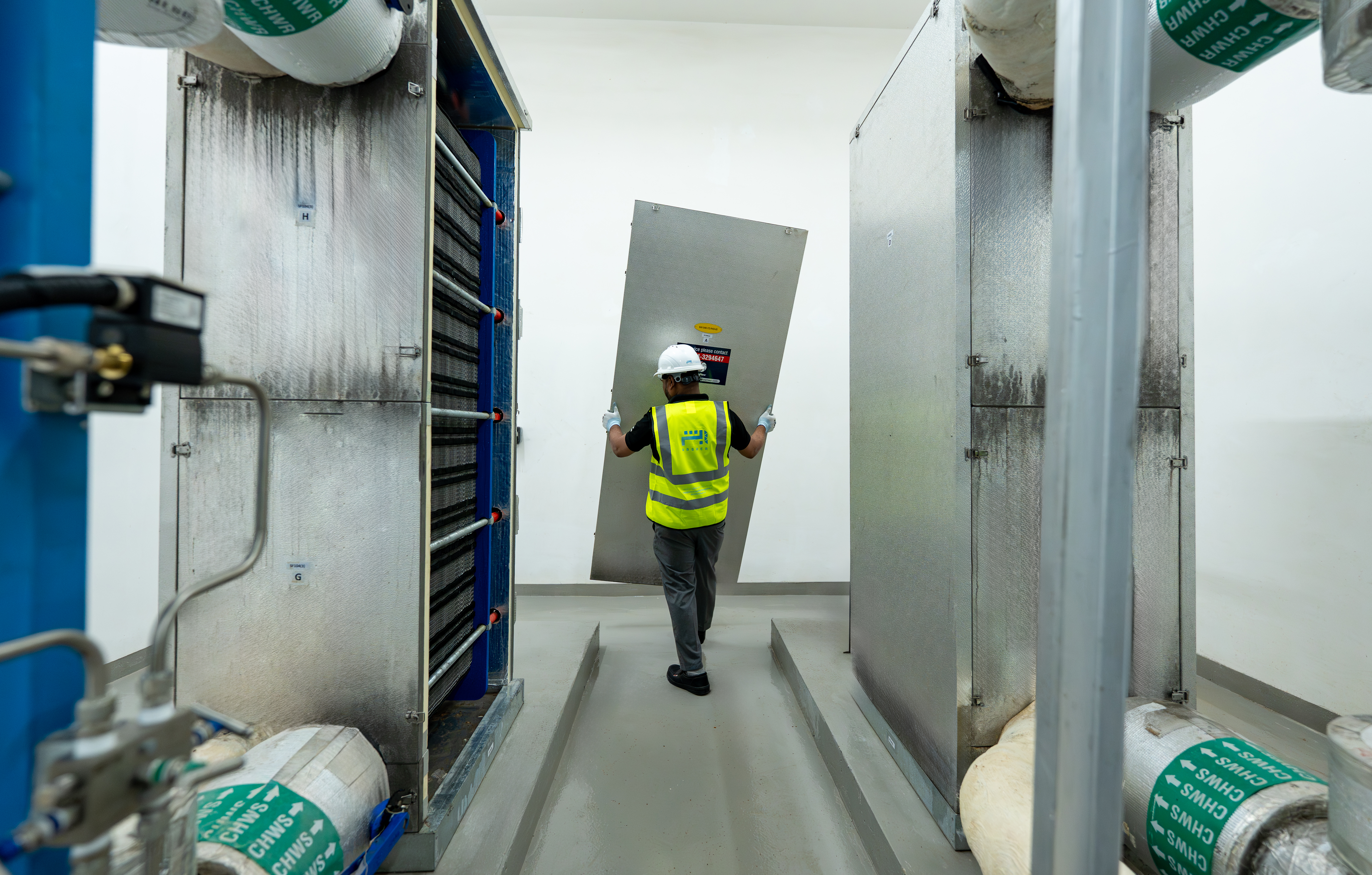 Cleaning team operating in a Grade-A lobby.